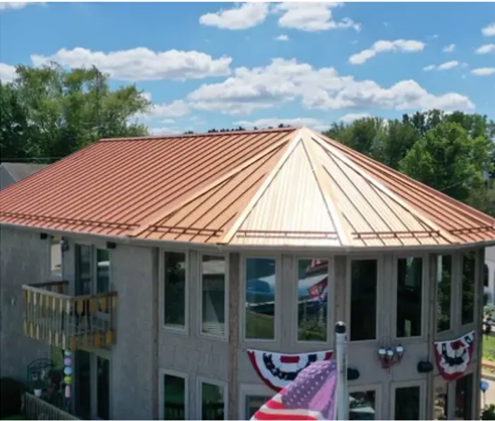 Storm damage documentation on a New Castle commercial building